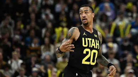 john collins signs deal