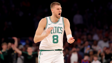 celtics send porzingis to hawks